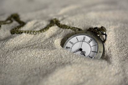 Clock in sand